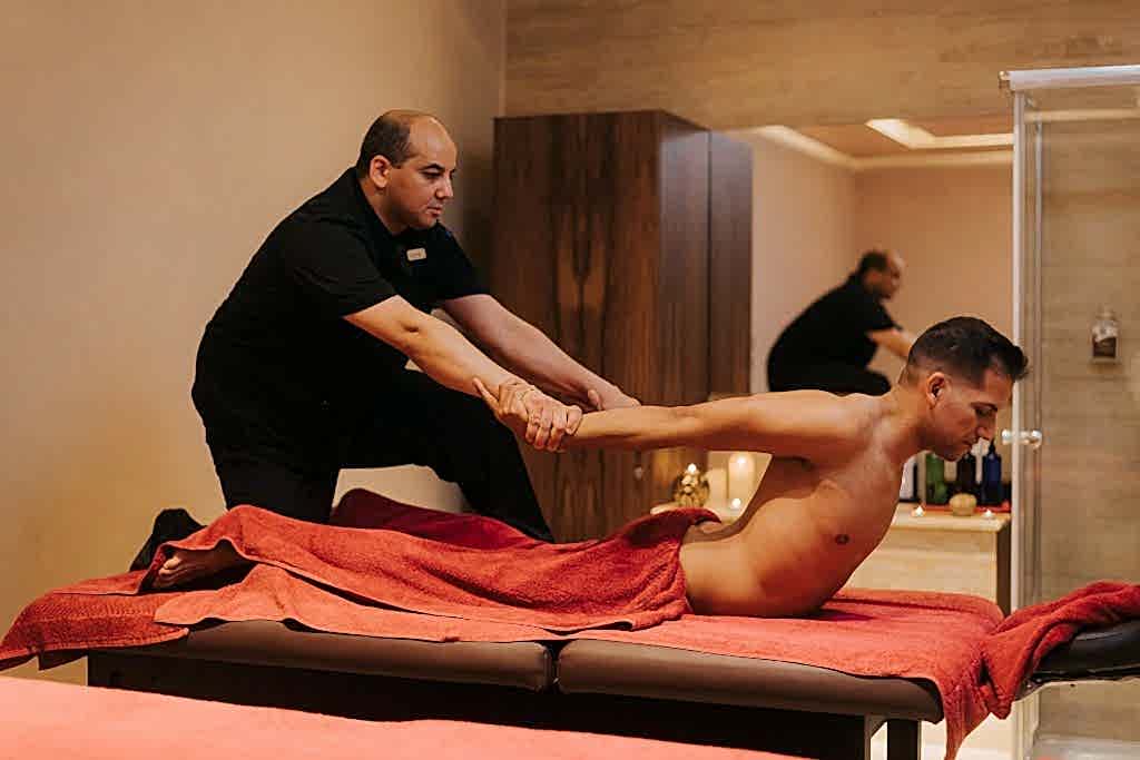 Body Cleansing With Mineral Salt Scrub - Adonis Men’s Grooming Salon Sports Massage